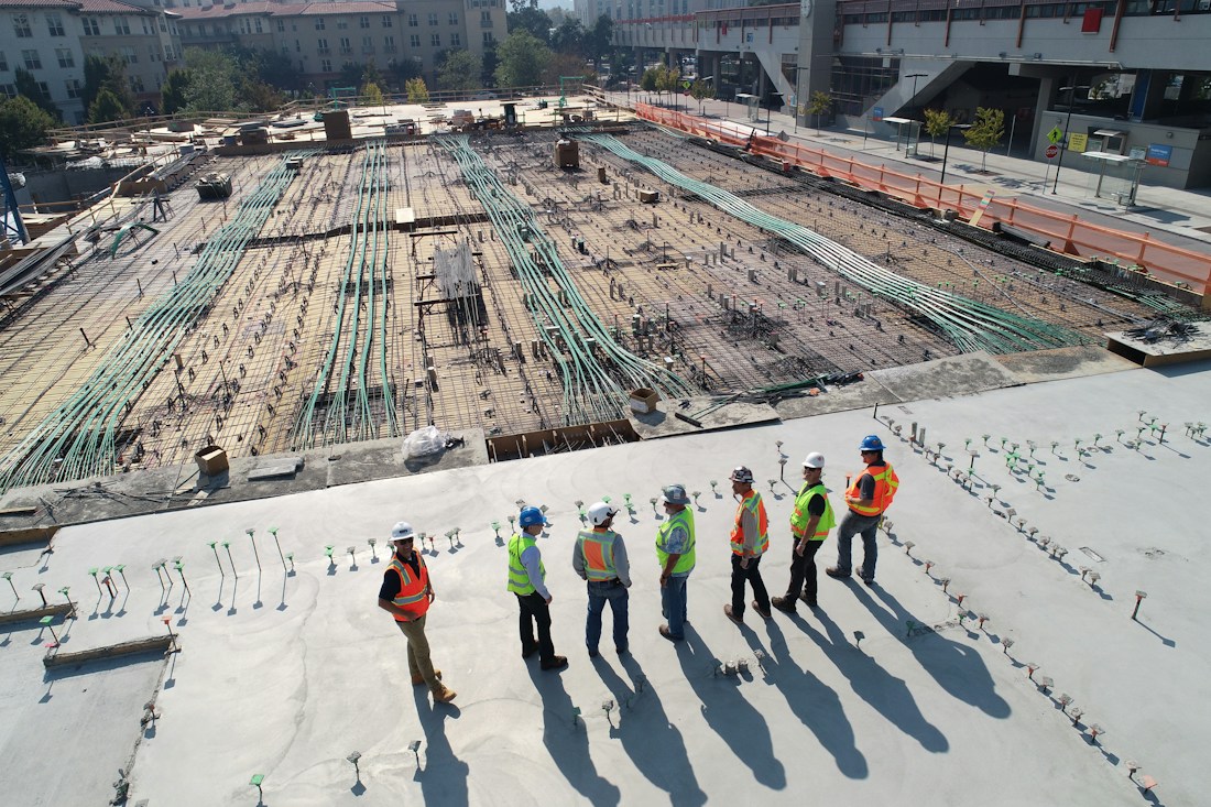 Crane and building structure at a construction site